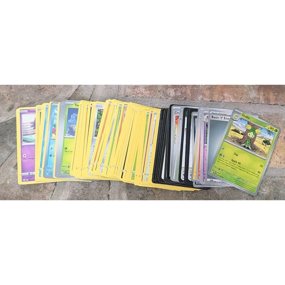 Pokeman Blissey tin (empty) With Over 75 Random Pokeman Cards